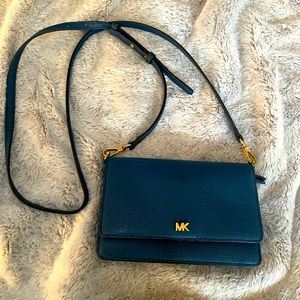 Small vibrant teal blue Michael Kors phone/wallet